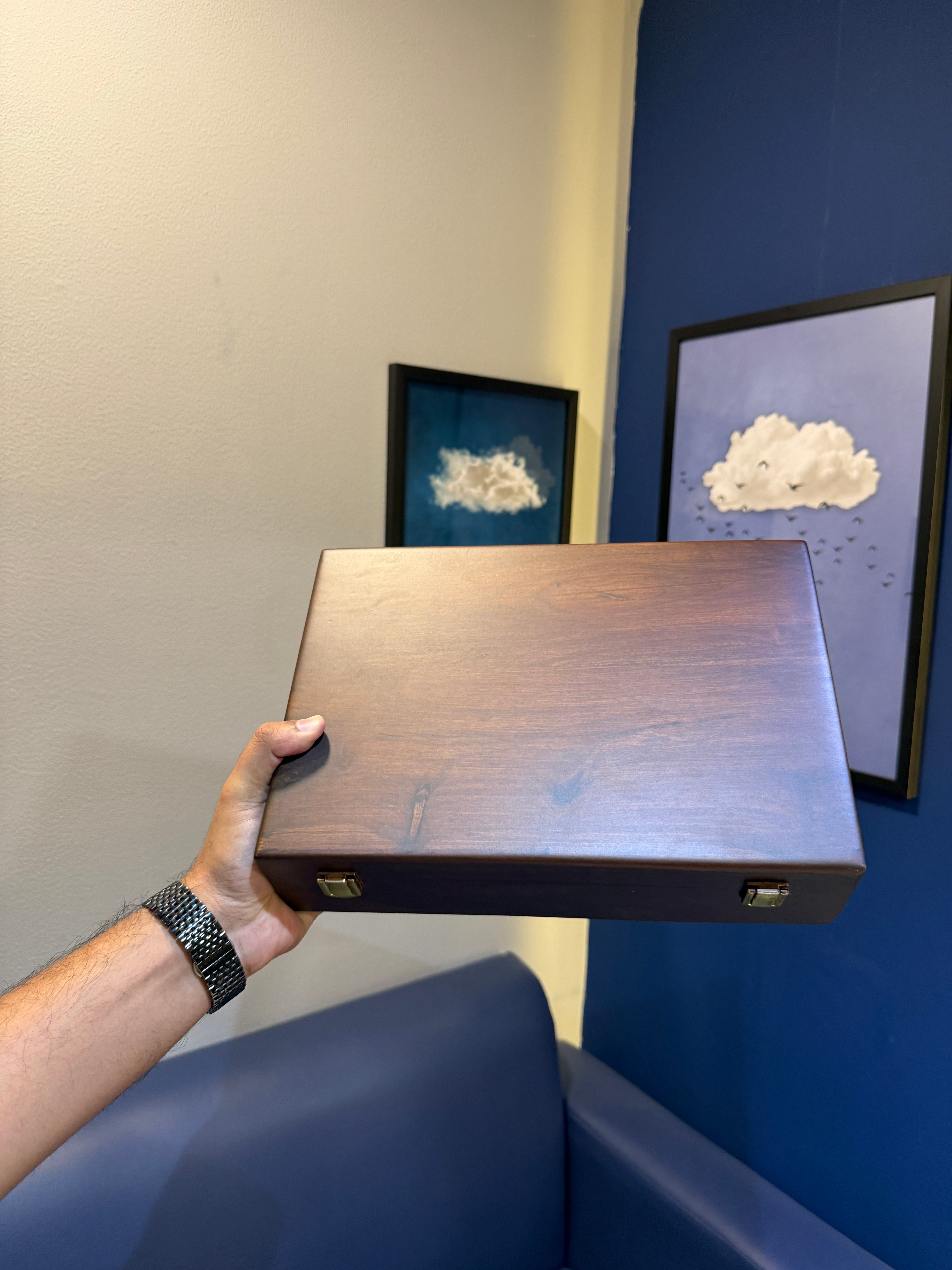 Rosewood watch box shown closed, front view