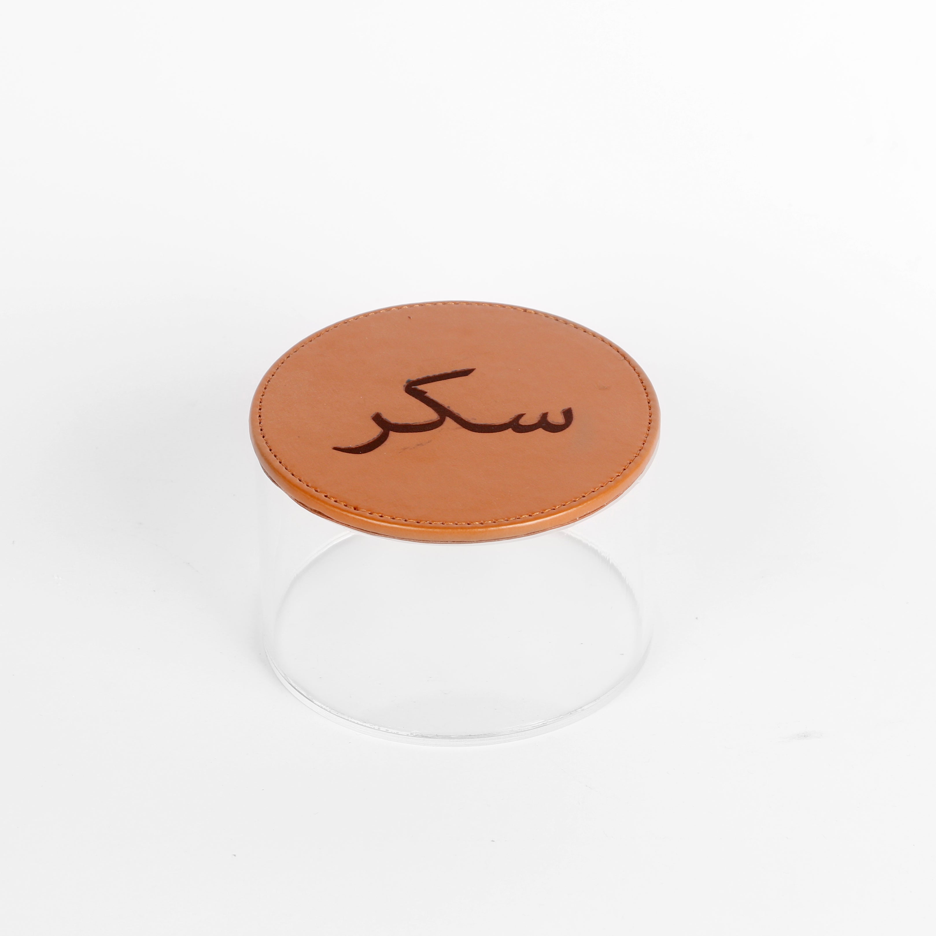 Round acrylic sugar box with leather cover from the Rafeeva double decker set